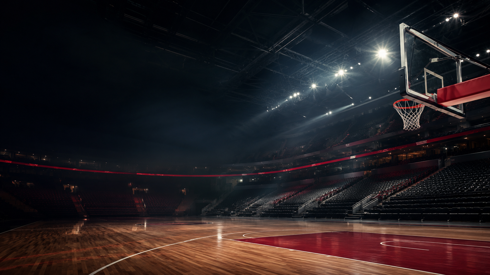 Empty professional basketball arena under dramatic lights